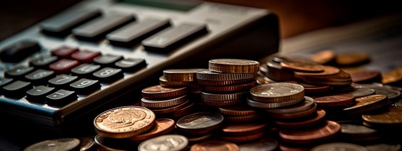 Calculadora con monedas apiladas